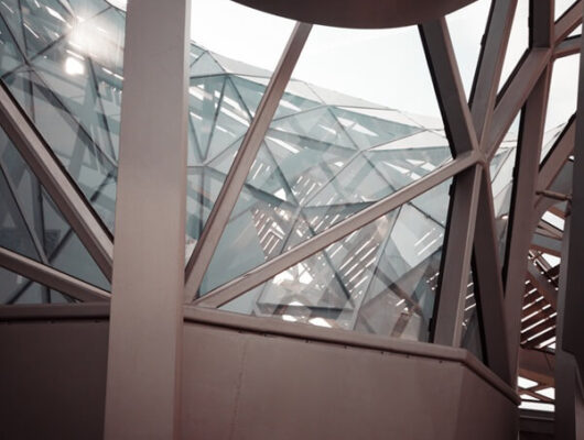 low-angle-photography-grey-concrete-building (1)