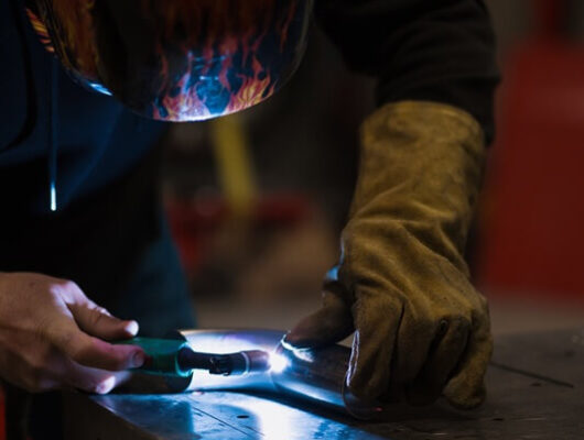 man-working-with-argon-welding-machine-garage (1)